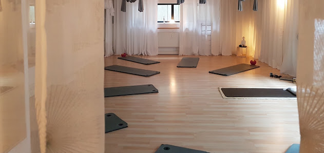 AdhunaVeda - Yoga Studio